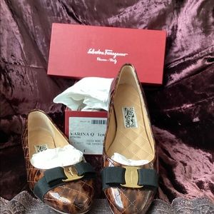 Ferragamo womens animal print ballet flats with bow.  Never worn size 10 in box.